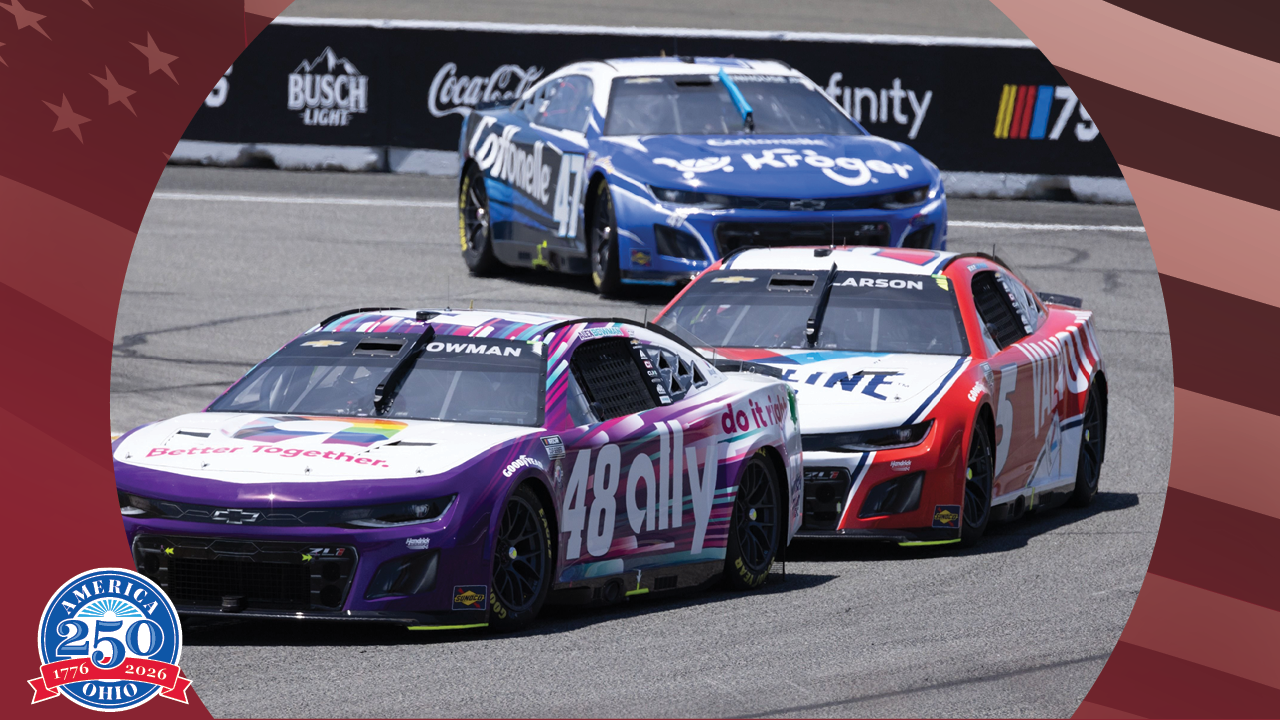 race cars driving around a track