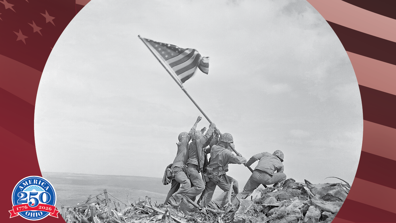 historic photo of Marines raising the flag on Iwo Jima
