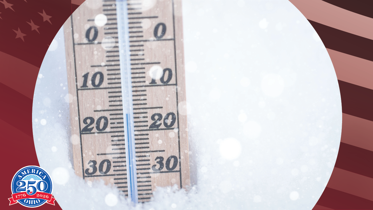 a thermometer plunged into a pile of snow