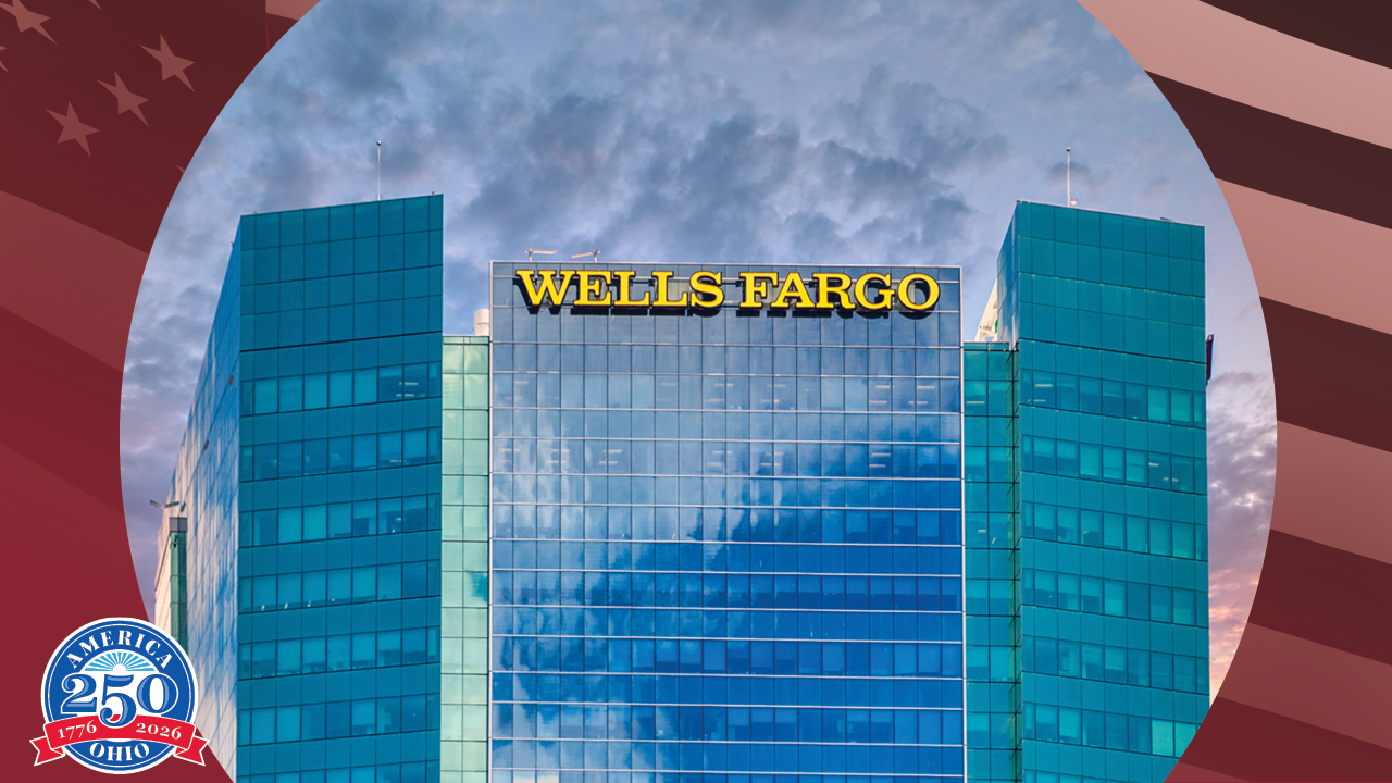 glass high rise building with Wells Fargo logo on top