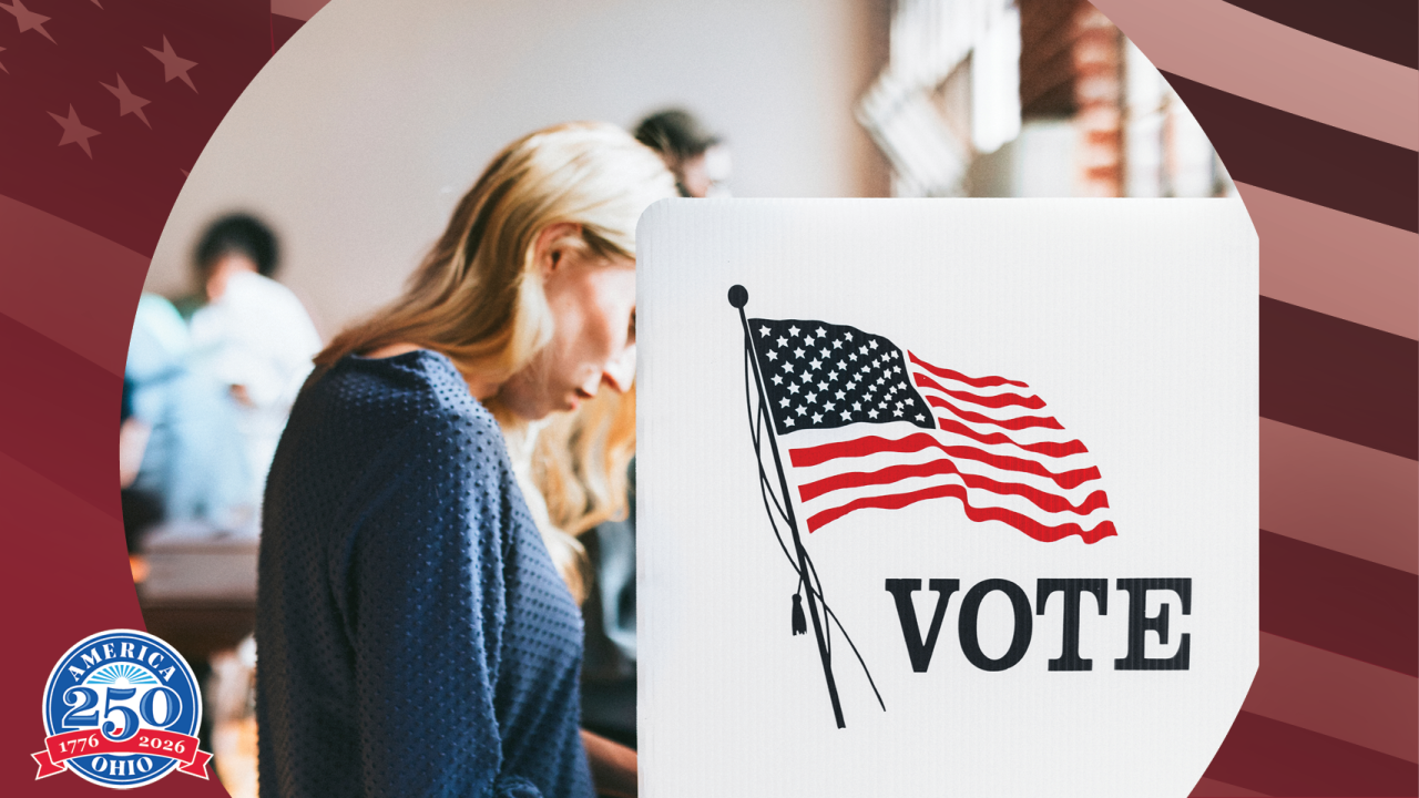 woman voting in a voting booth