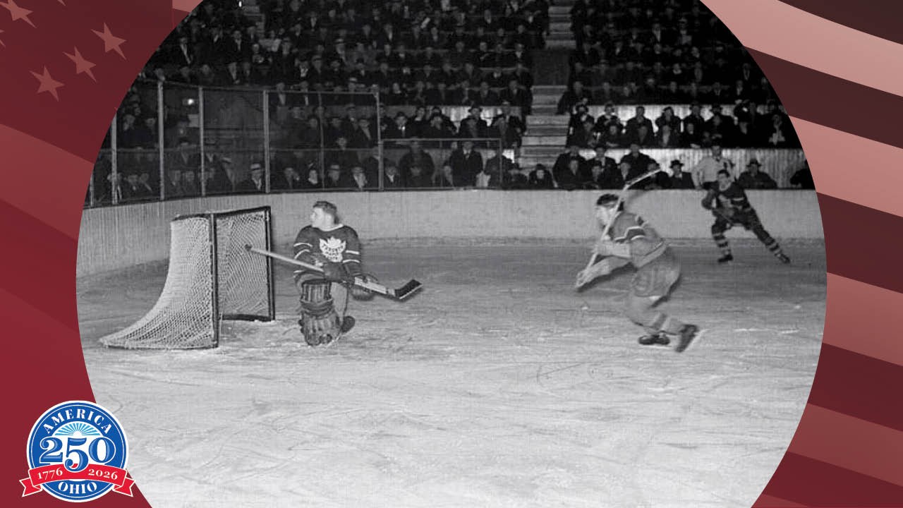 Historic photo of hockey players on the ice playing hockey