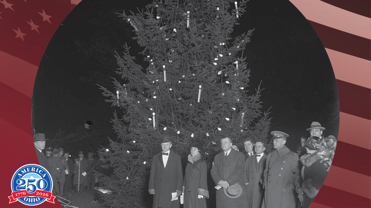 Historic photo of large tree decorated for the holidays