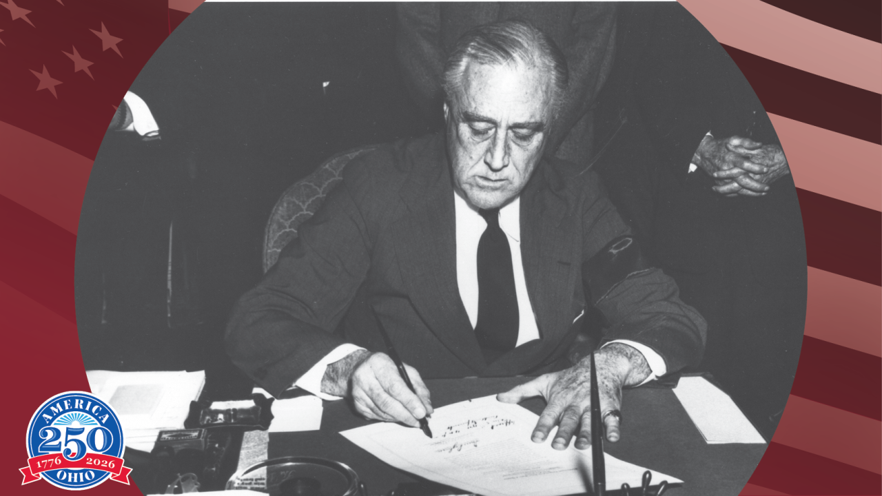 Historic photo of Franklin Roosevelt signing document