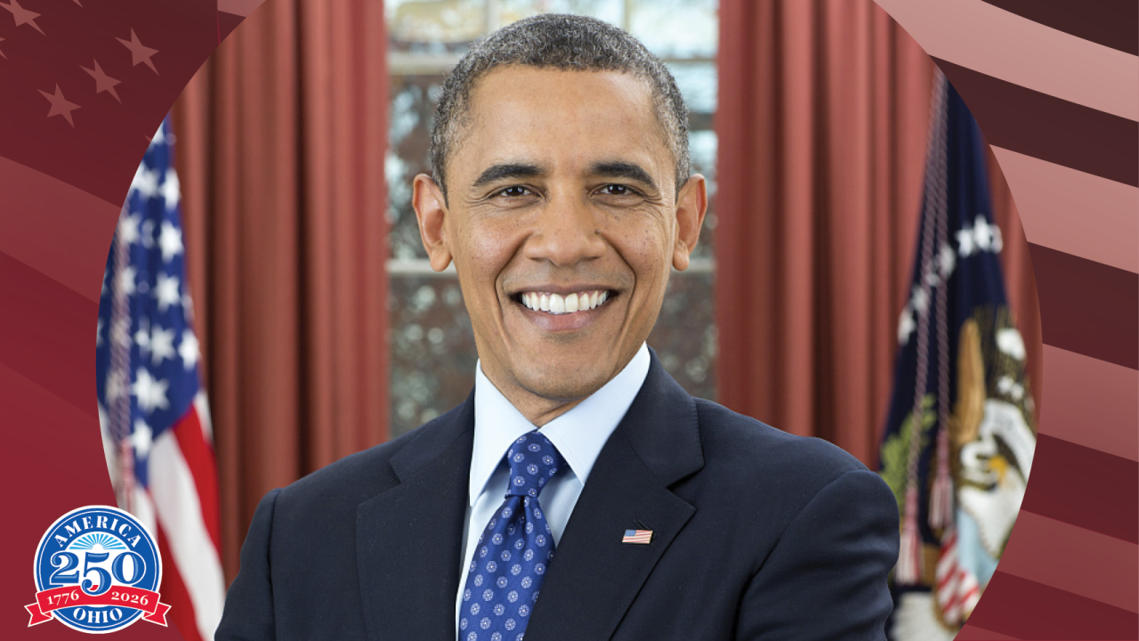 President Barrack Obama standing in the Oval Office