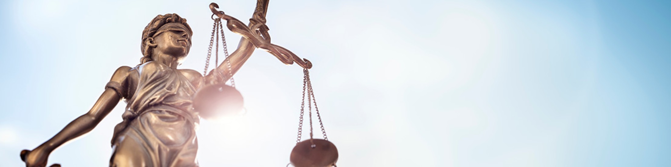 Lady justice statue with two scales