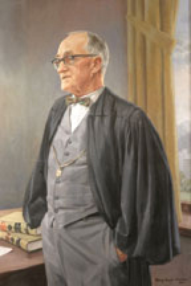 Image showing a painted portrait of a man wearing a grey suit, bow tie and black judicial robe.